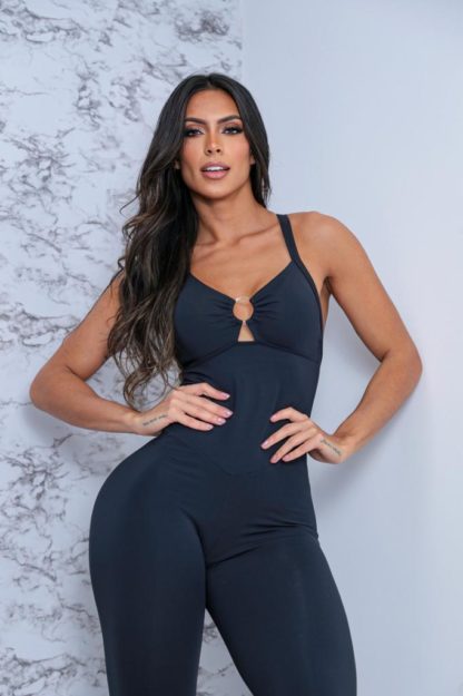 A black workout jumpsuit with a ring